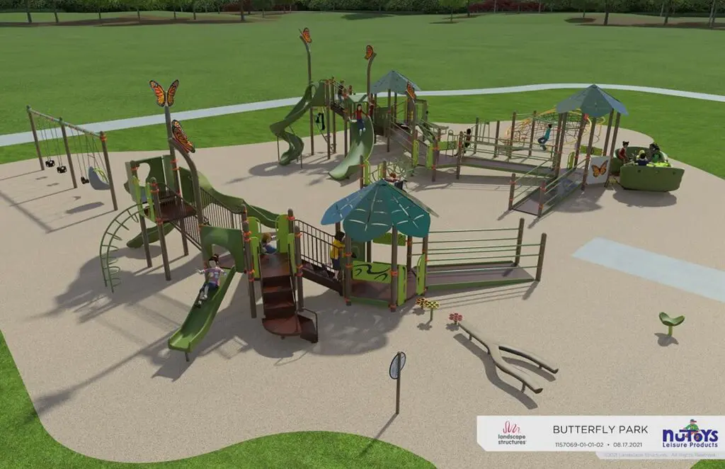 a playground with a slide and a butterfly on top