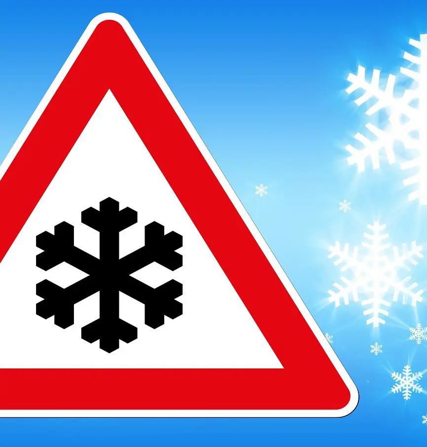 a snowflake sign with snowflakes