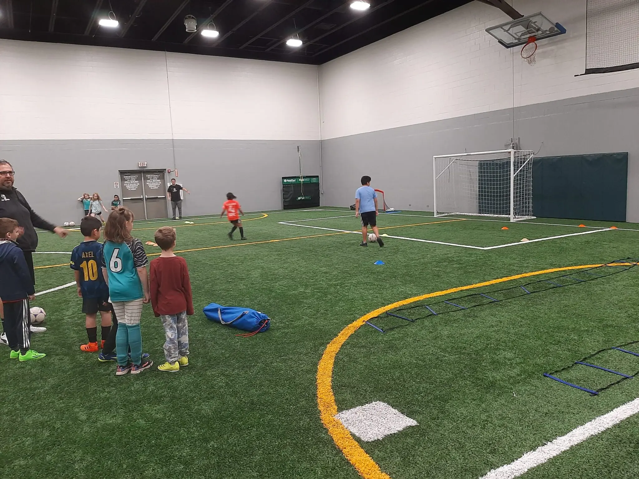 a group of kids on a football field