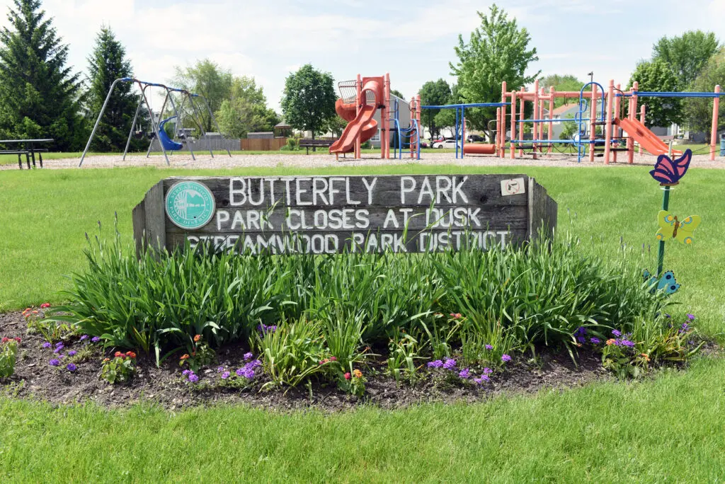 a sign in a park