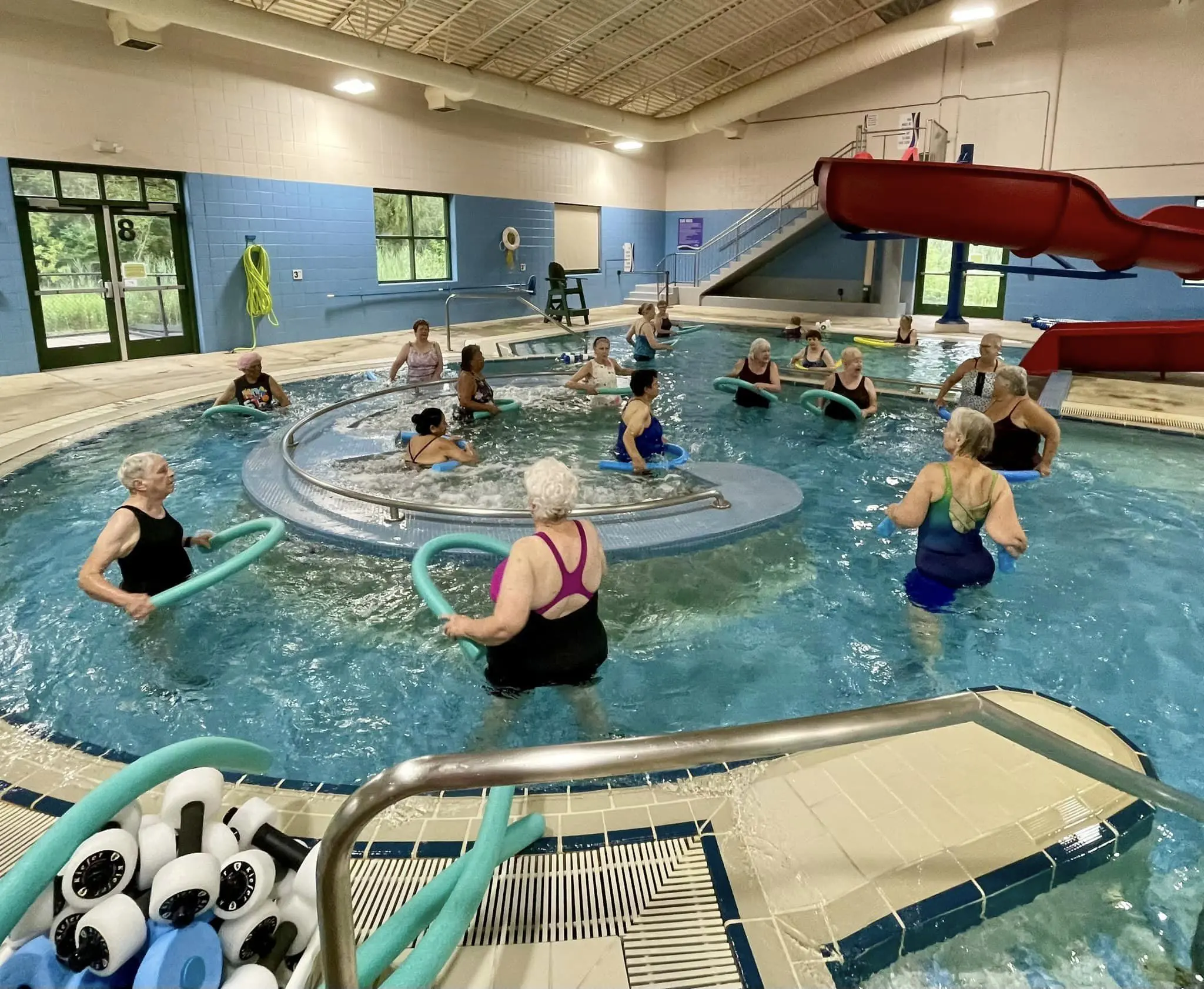 a group of people in a pool