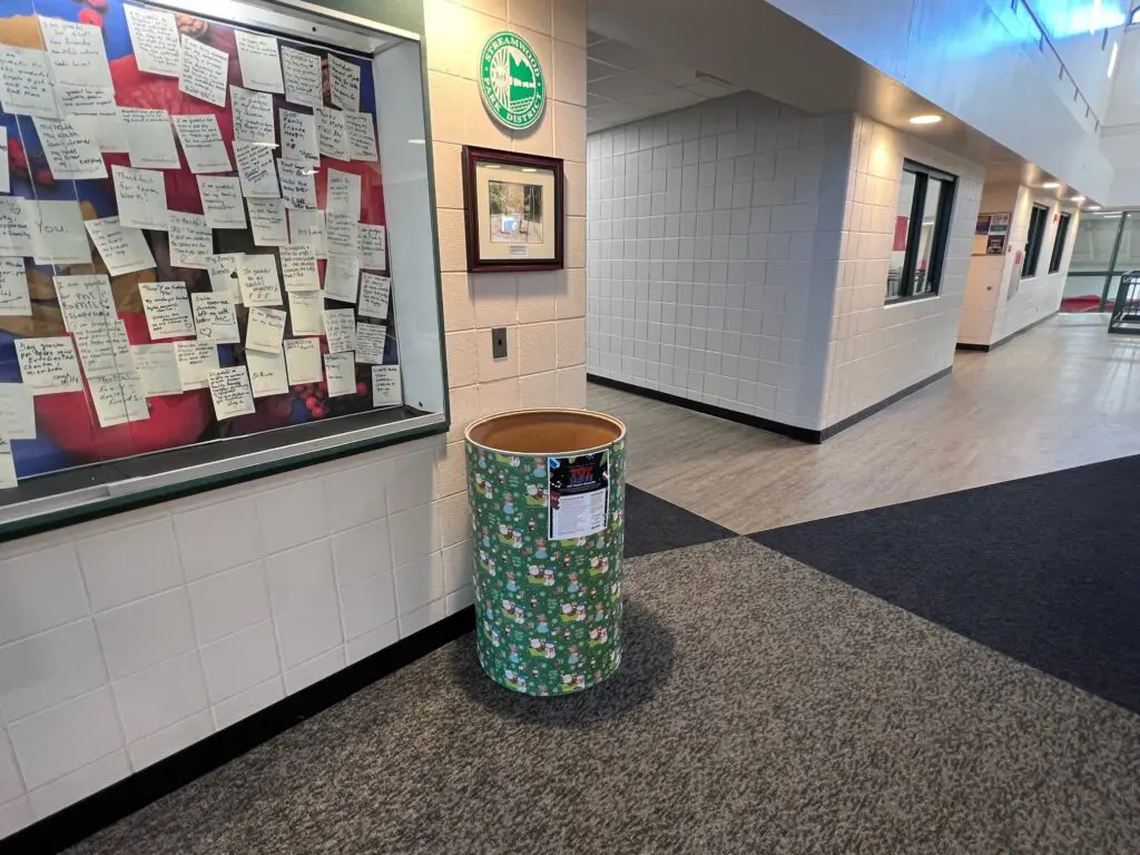 a trash can in a hallway