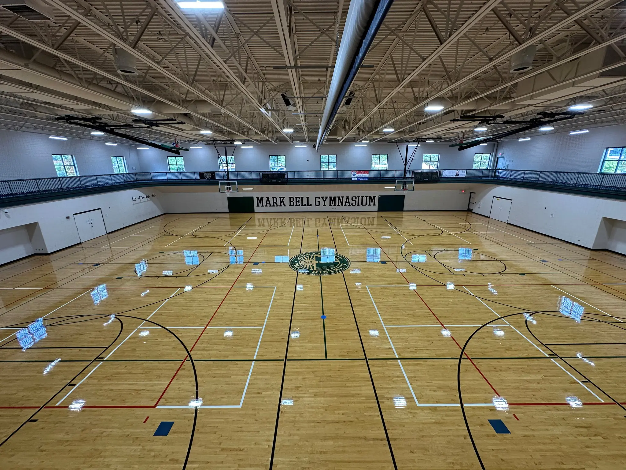 a gym with a basketball court