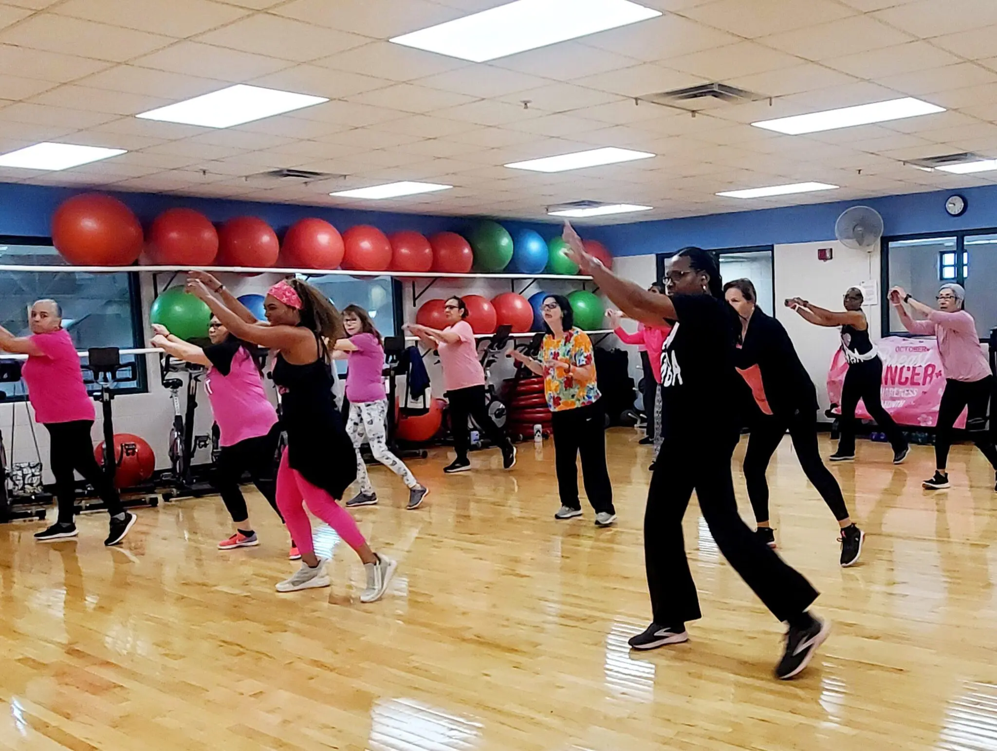 a group of people in a gym