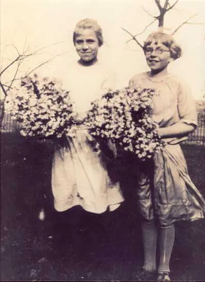 a couple of people holding flowers