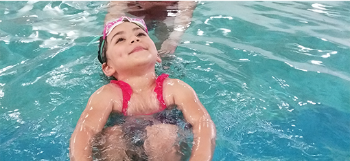 a child in a pool