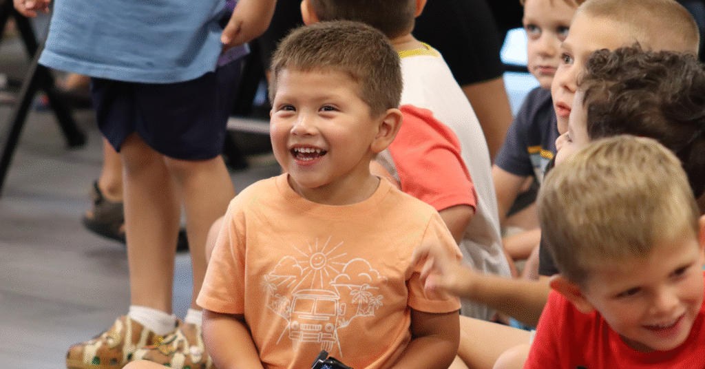 a child smiling at camera