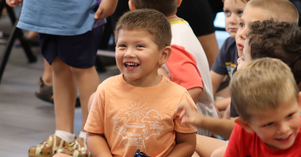 a child sitting in a circle