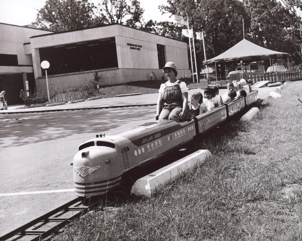 vintage photo of kids riding a toy train