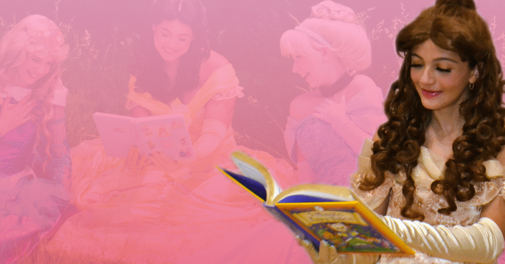 Brown-haired princess in a golden dress reading a book with a 3 princesses in the background behind a pink-hued backdrop.